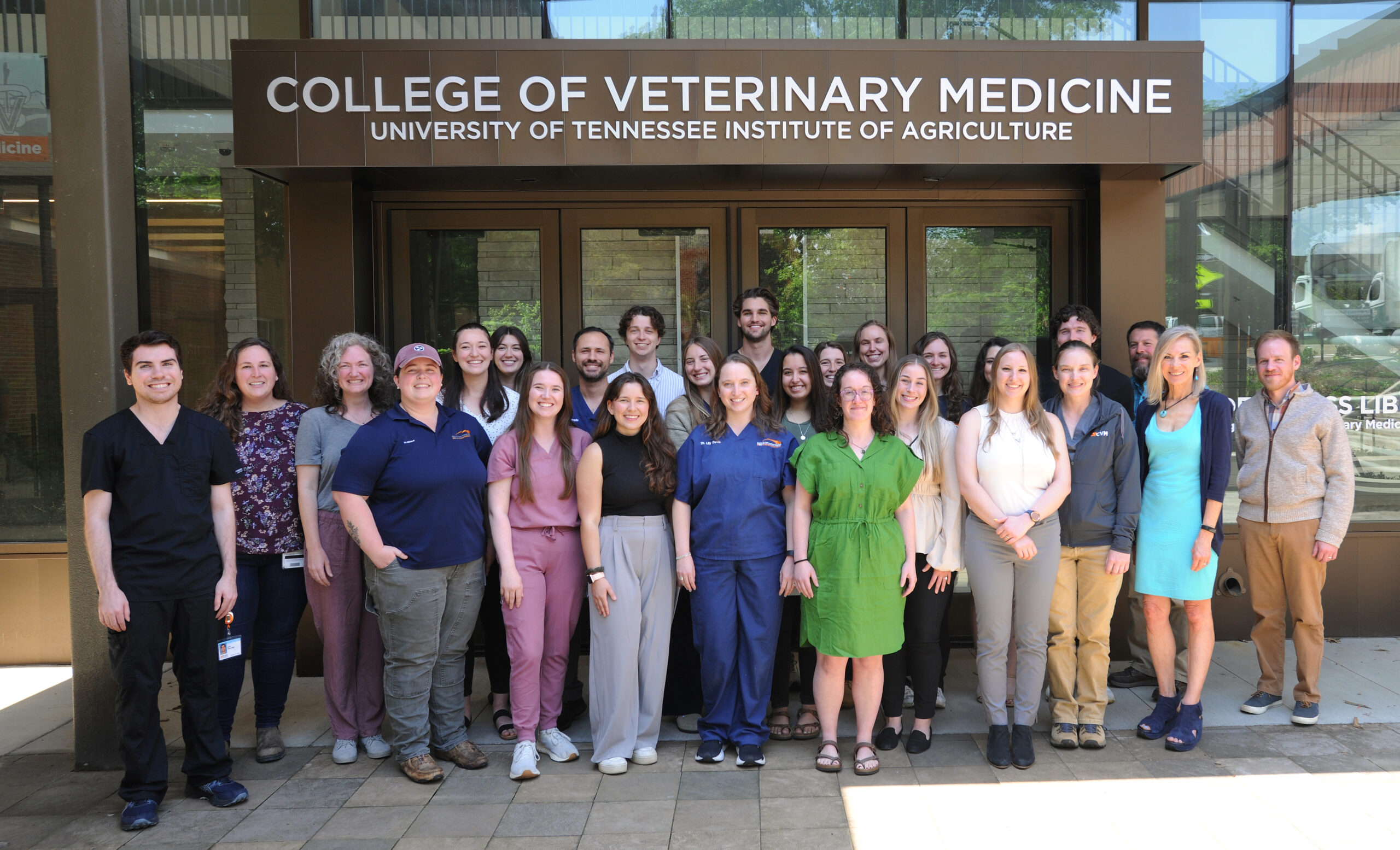The 2025 Phi Zeta inductees stand in front of the College of Veterinary Medicine Teaching and Learning Center.