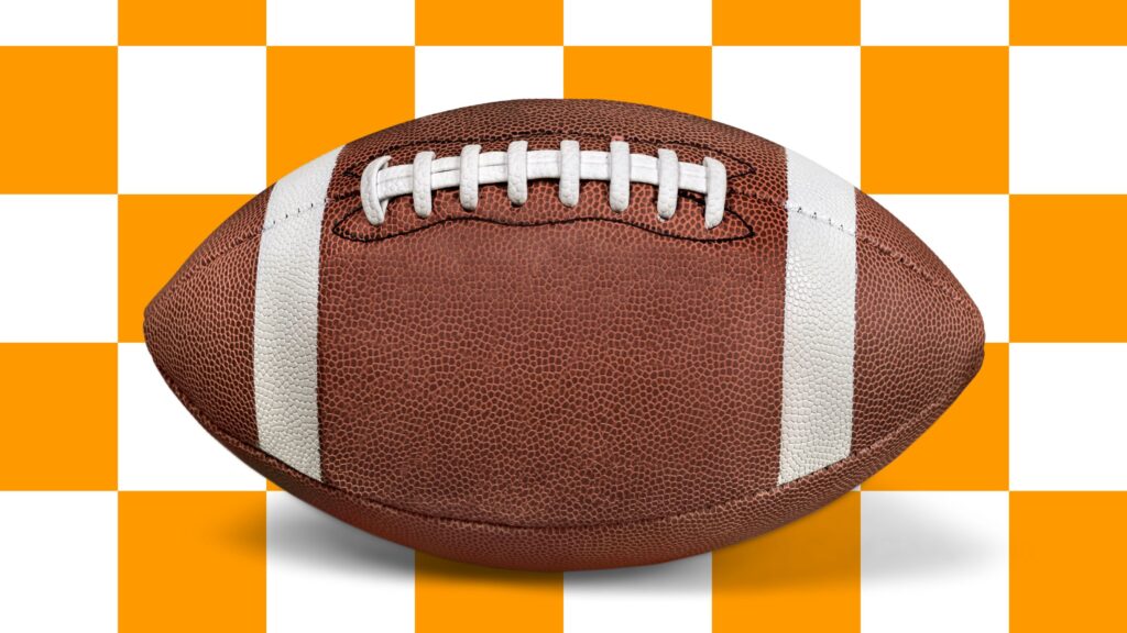 Image of a football on a white and orange checkered bbackground
