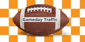 Image of football on orange and white checkerboard with Gameday Traffic written on football
