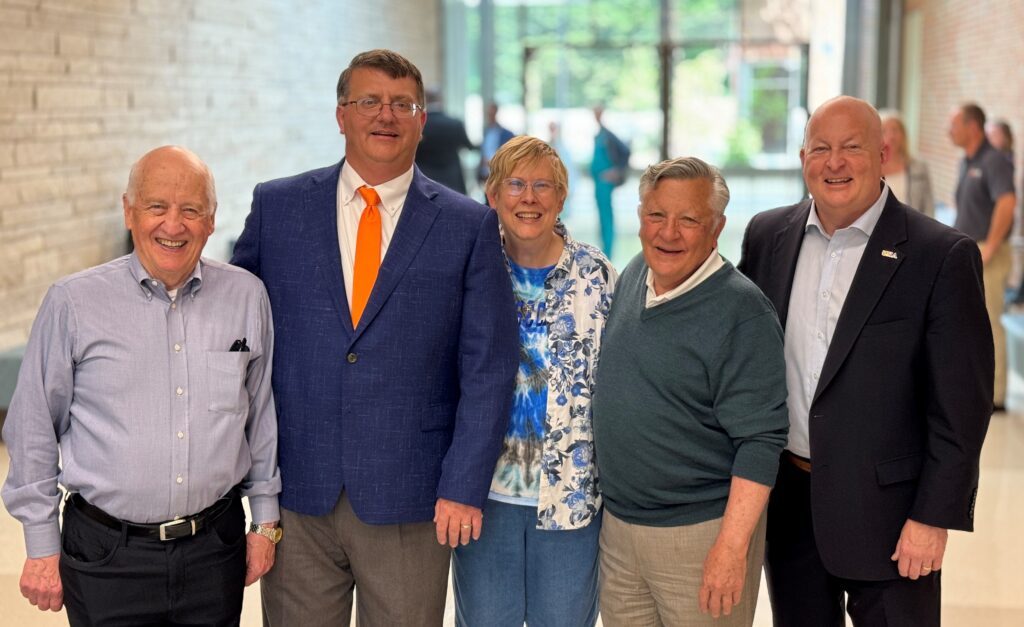 Dean Paul Plummer stands with 3 former veterinary faculty members and Keith Carver.