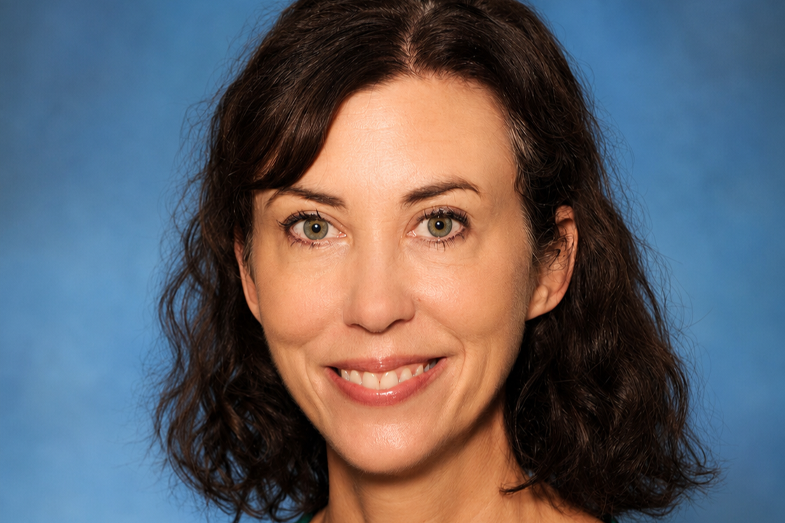 Angela Rollins in scrubs cropped