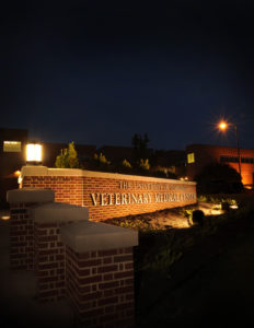 UT Veterinary Medical Center sign lit up at night